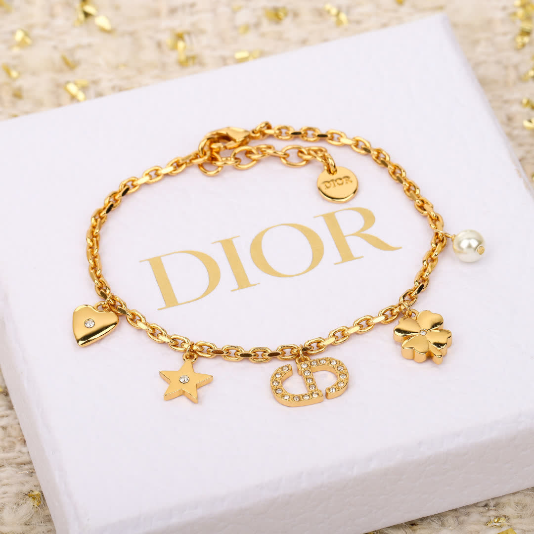 Van Cleef & Arpels Gold Tone Charm Bracelet