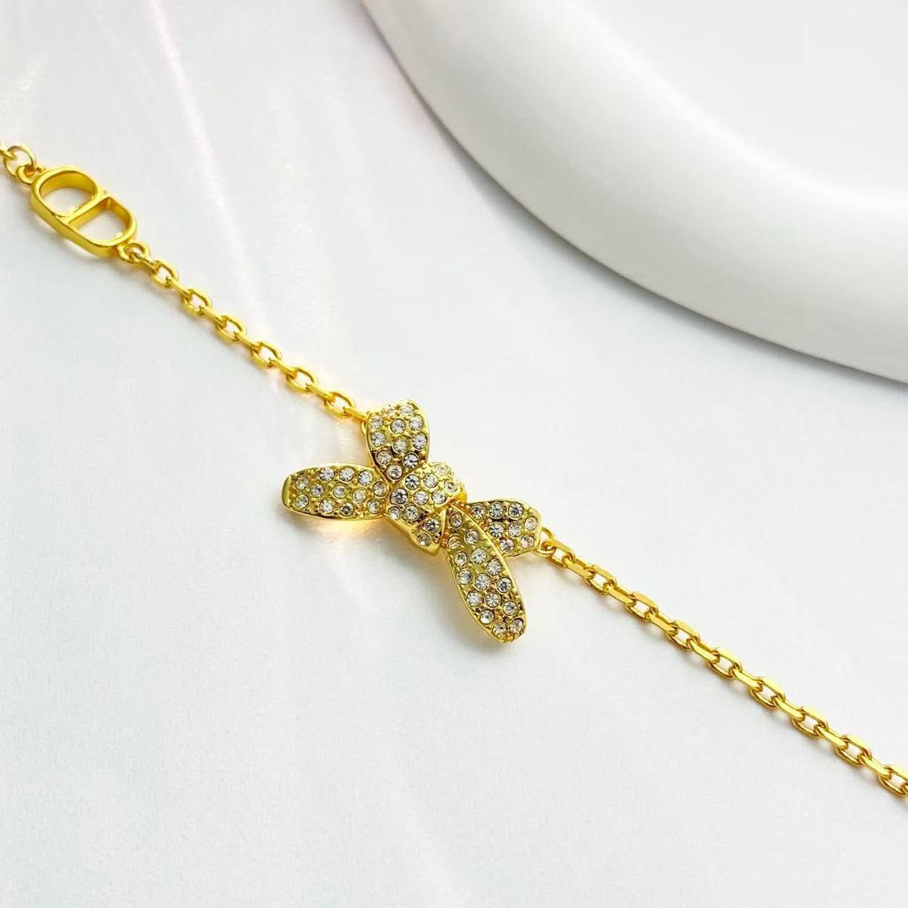 Dior Gold-Tone Crystal Bow Bracelet