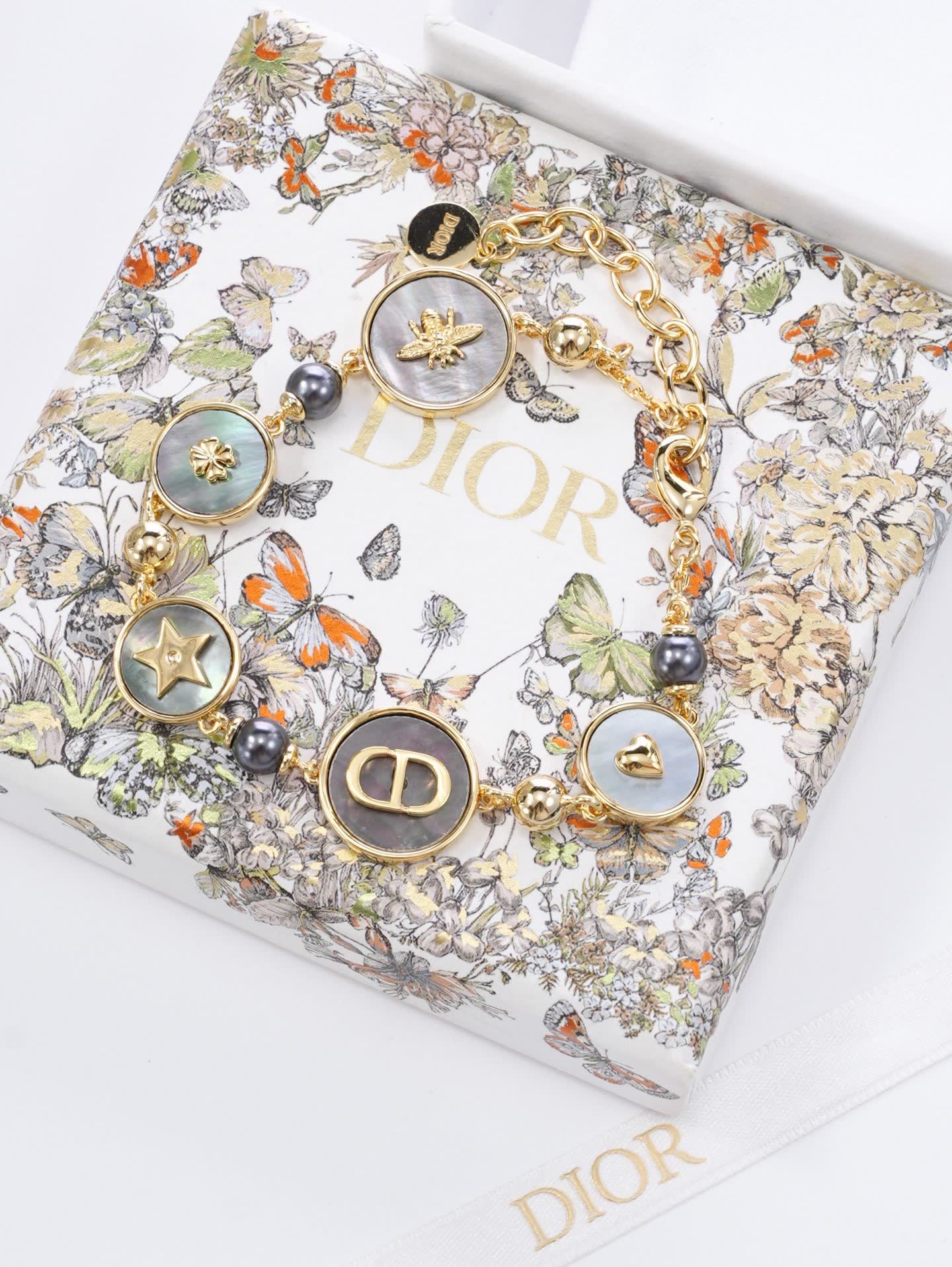 Dior Gold-Tone Bracelet with Pearls and Charms Dior Gold-Tone Bracelet with Pearls and Charms