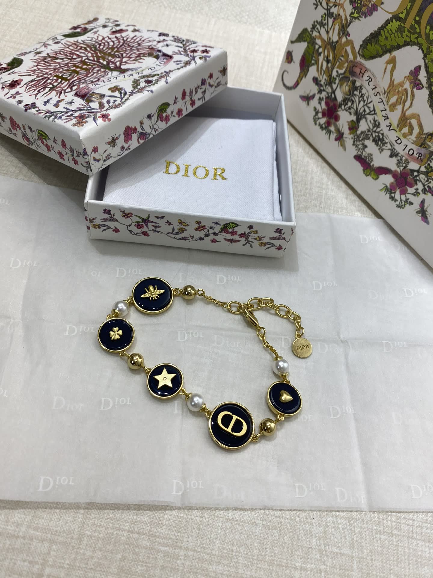 Dior Gold Tone Bracelet with Enamel and Pearl Accents Dior Gold Tone Bracelet with Enamel and Pearl Accents