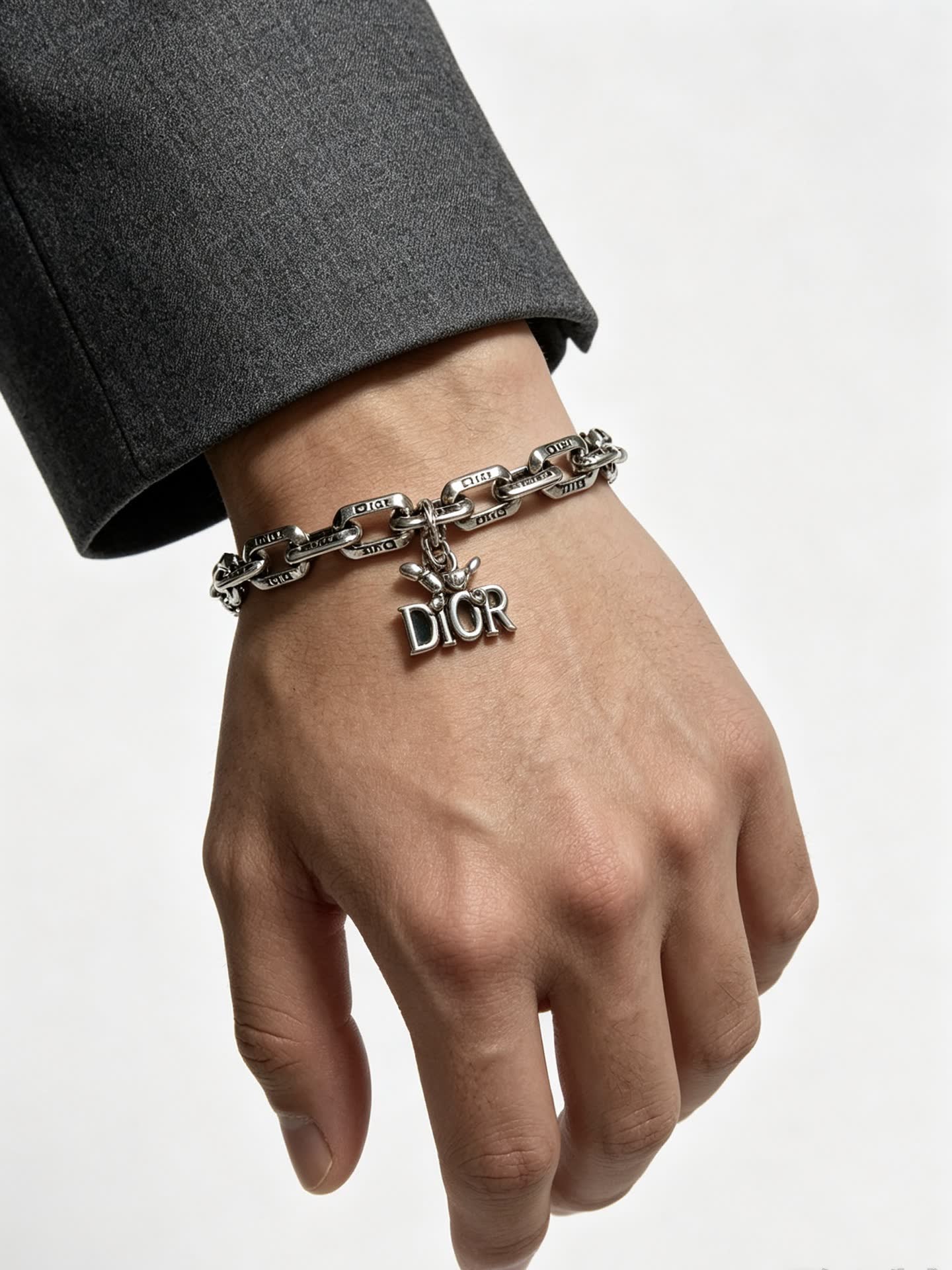 Dior Silver Tone Bracelet with Logo Charm