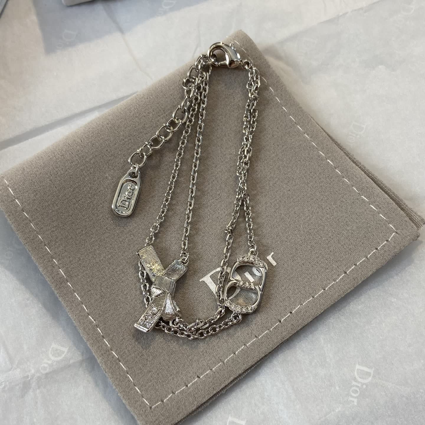 Dior Silver Tone Chain Bracelet with Bow and Logo