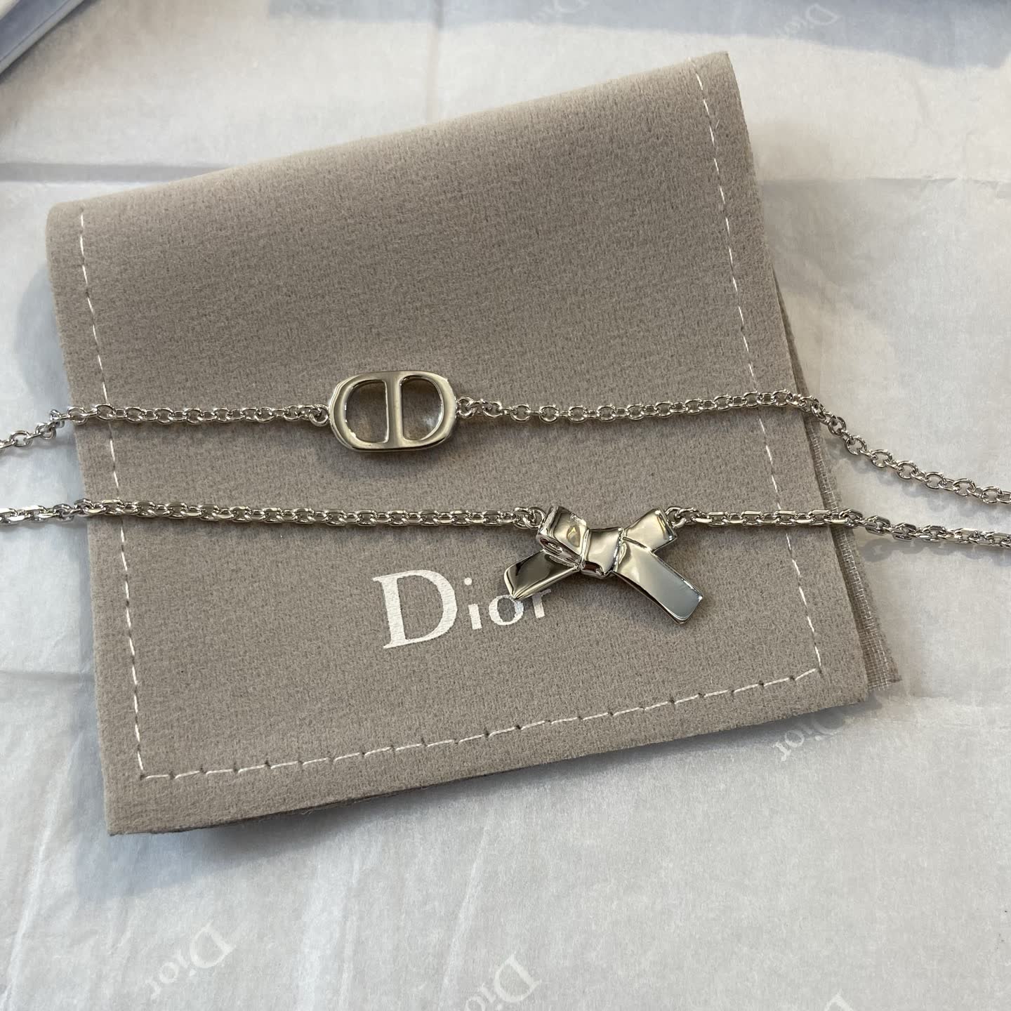 Dior Silver Tone Chain Bracelet with Bow and Logo