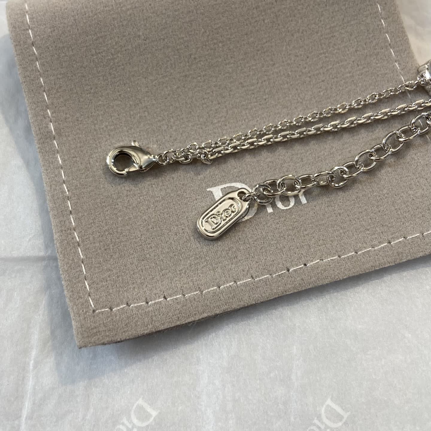 Dior Silver Tone Chain Bracelet with Bow and Logo