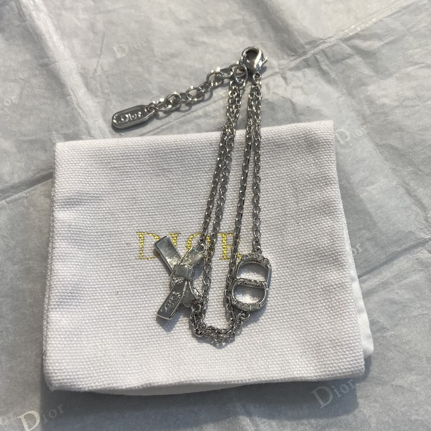 Dior Silver Tone Bracelet with Bow and Double 'D' Charm