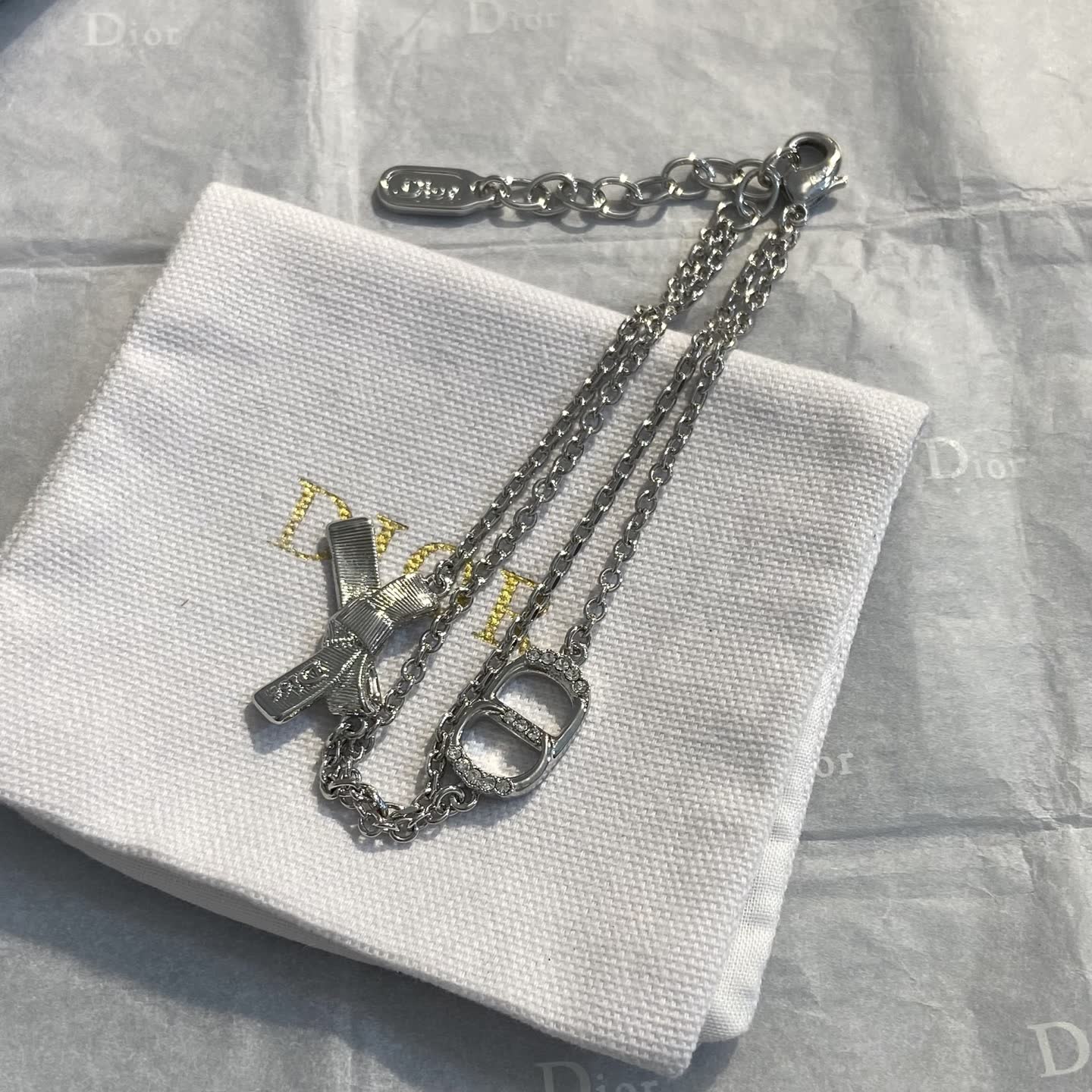 Dior Silver Tone Bracelet with Bow and Double 'D' Charm