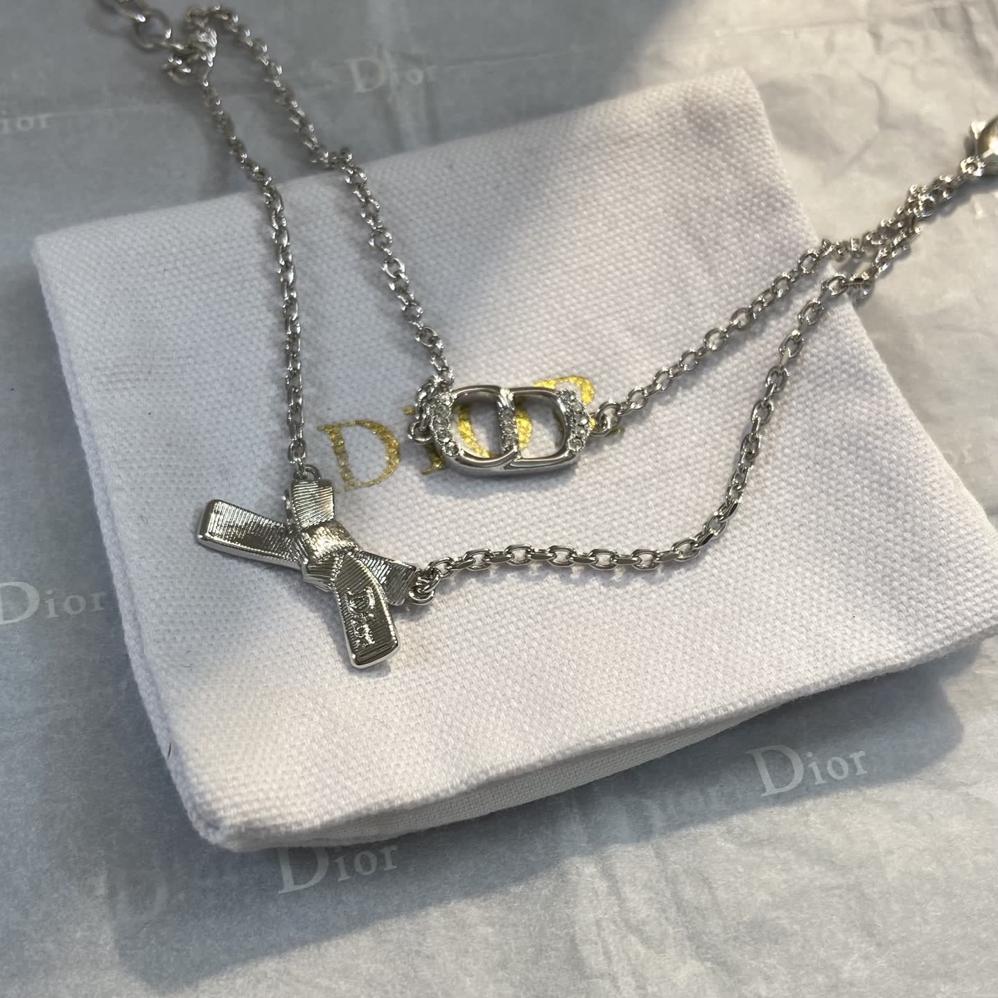 Dior Silver Tone Bracelet with Bow and Double 'D' Charm