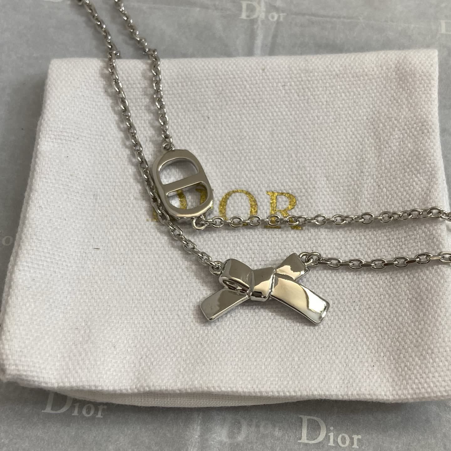 Dior Silver Tone Bracelet with Bow and Double 'D' Charm