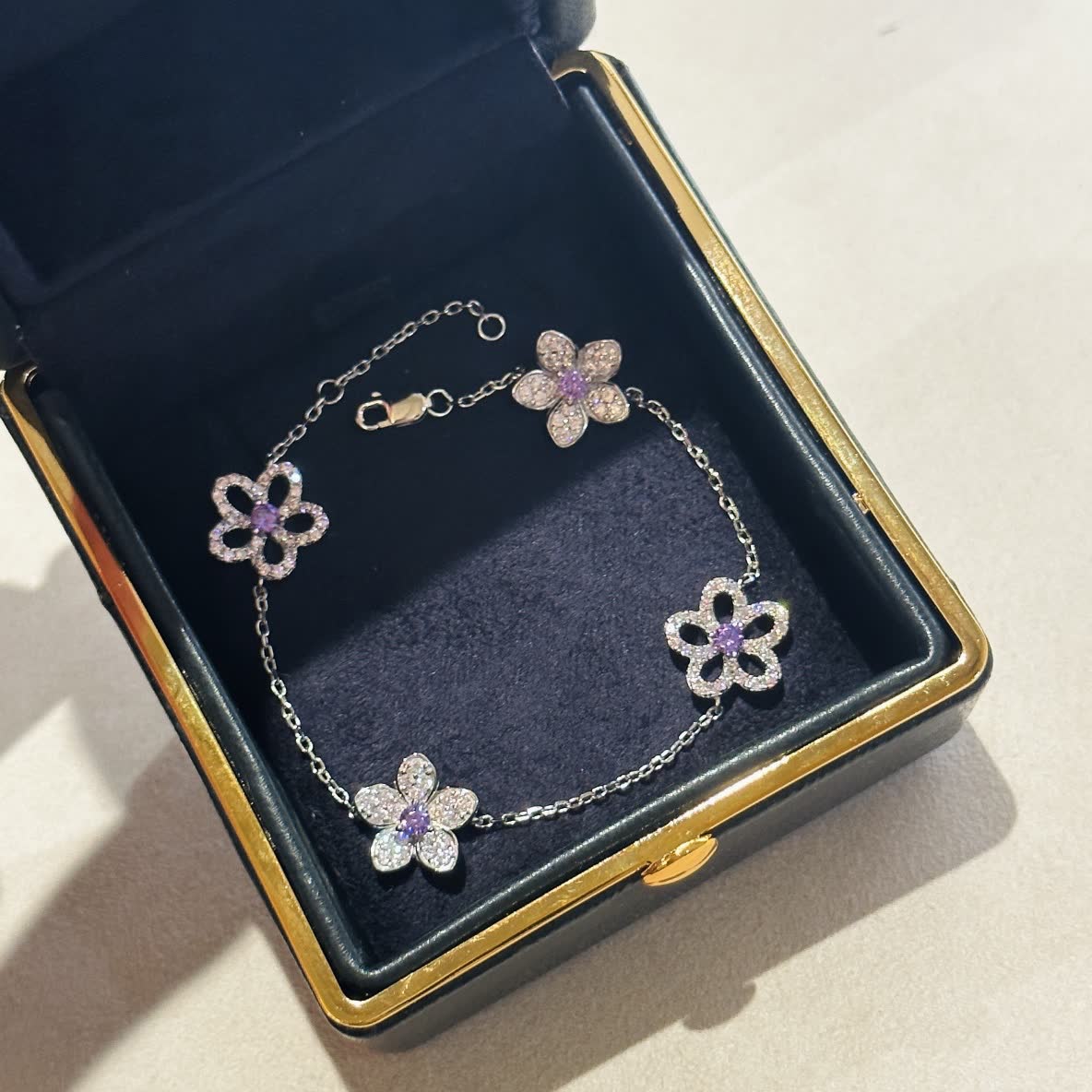 Graff Elegant Silver Flower Bracelet with Purple Stones