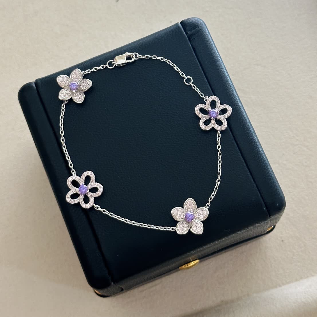Graff Elegant Silver Flower Bracelet with Purple Stones