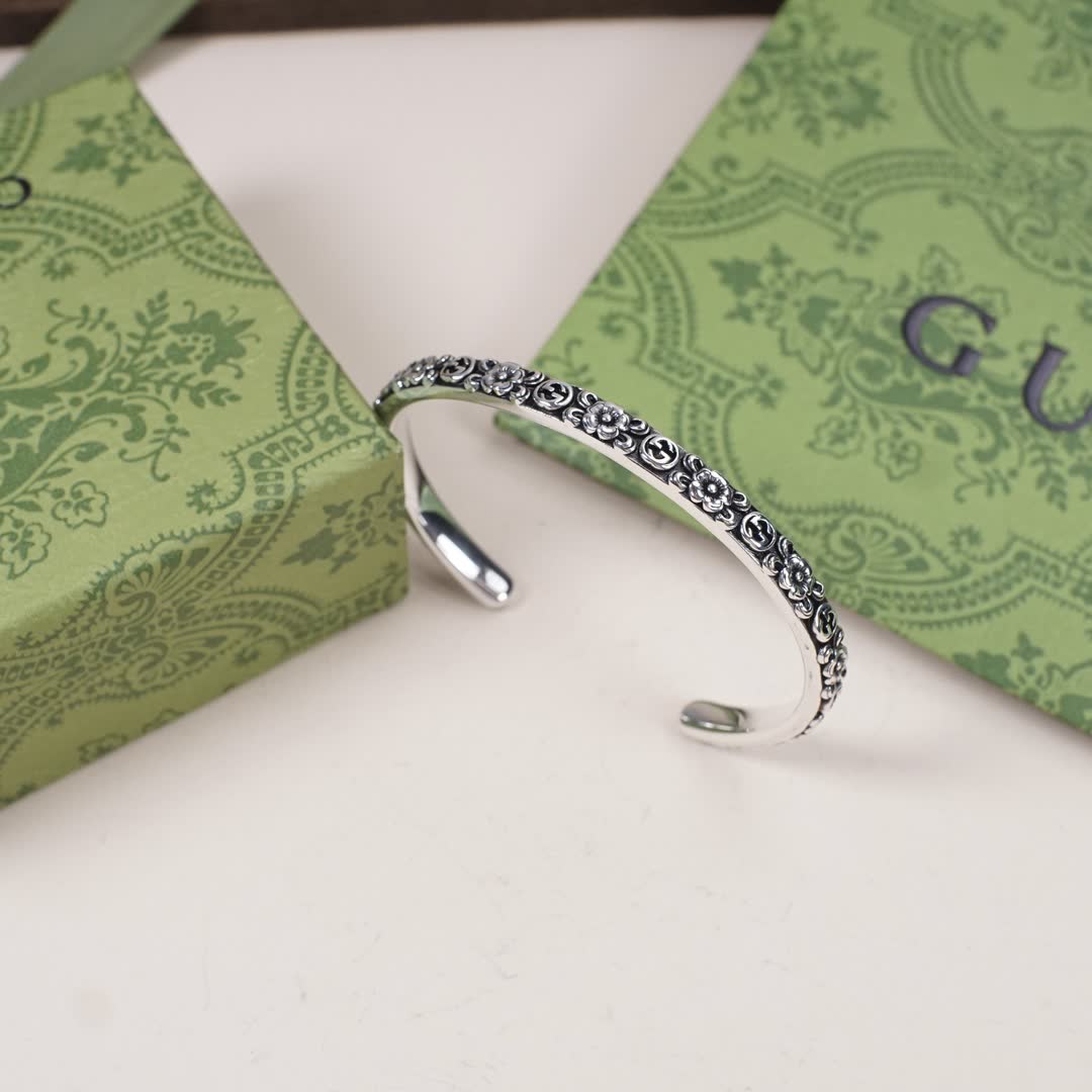 Gucci Silver Floral Embossed Cuff Bracelet Gucci Silver Floral Embossed Cuff Bracelet
