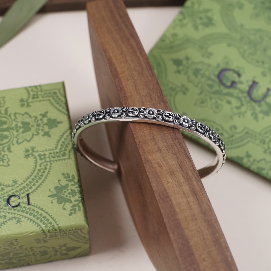 Gucci Silver Floral Embossed Cuff Bracelet