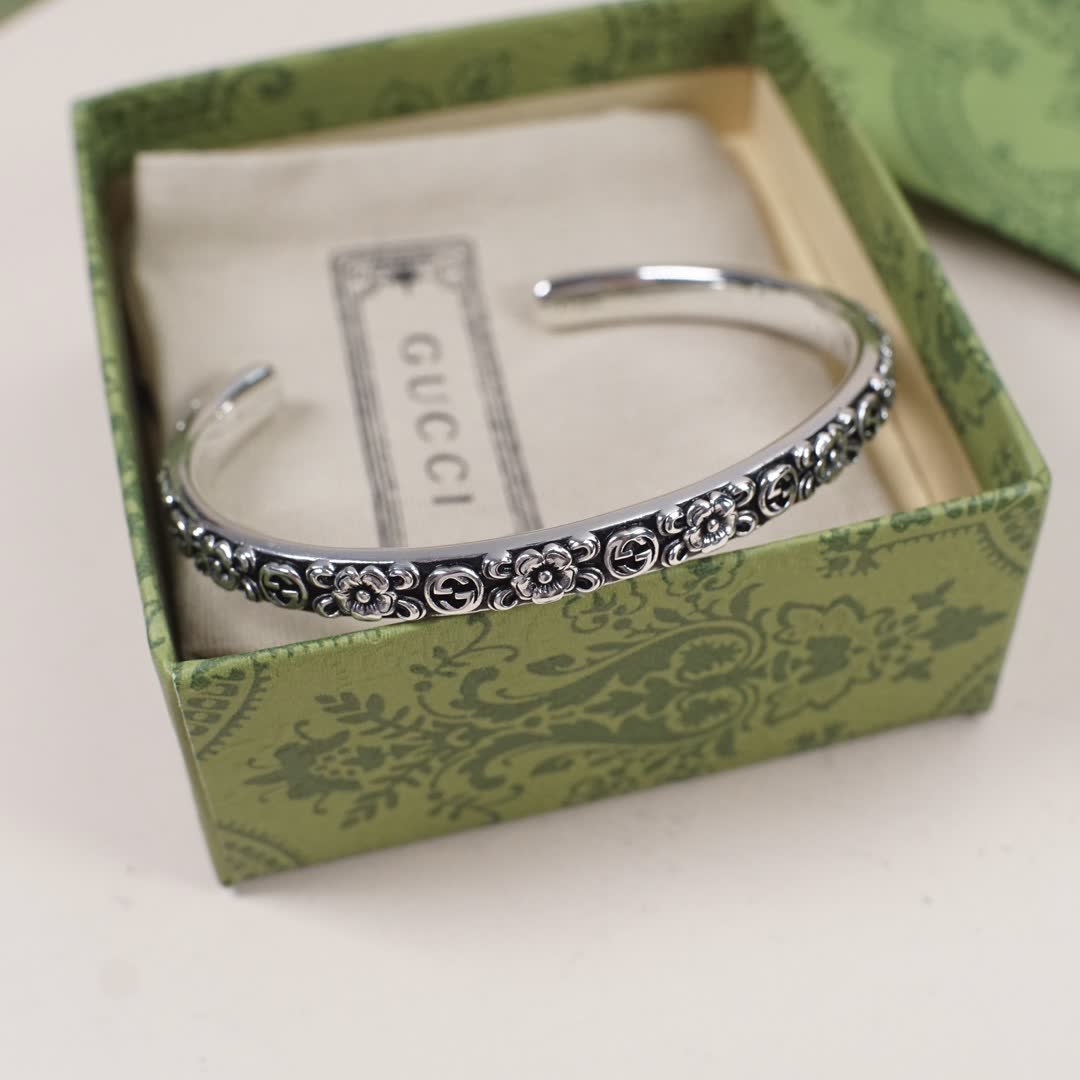 Gucci Silver Floral Embossed Cuff Bracelet