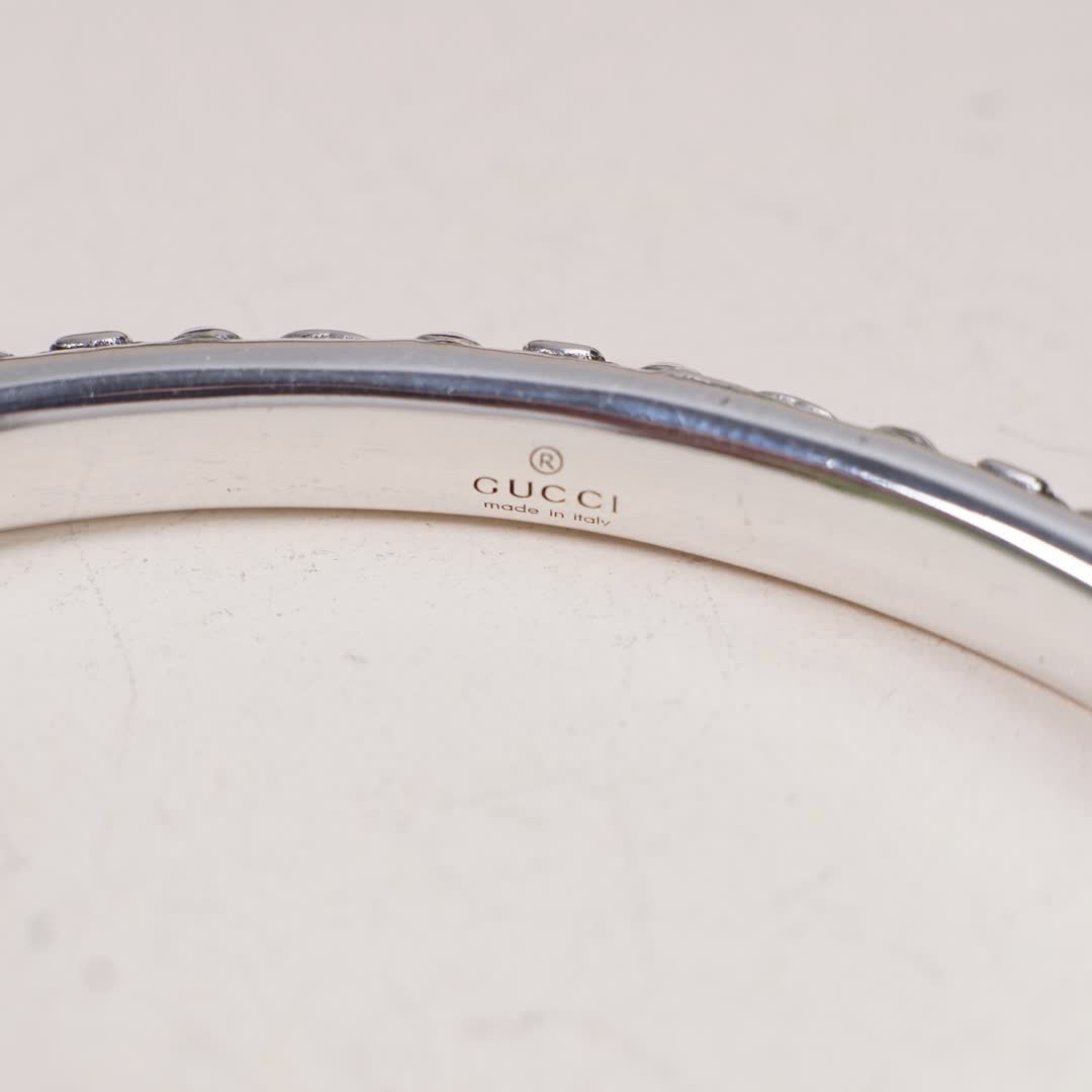 Gucci Silver Floral Embossed Cuff Bracelet