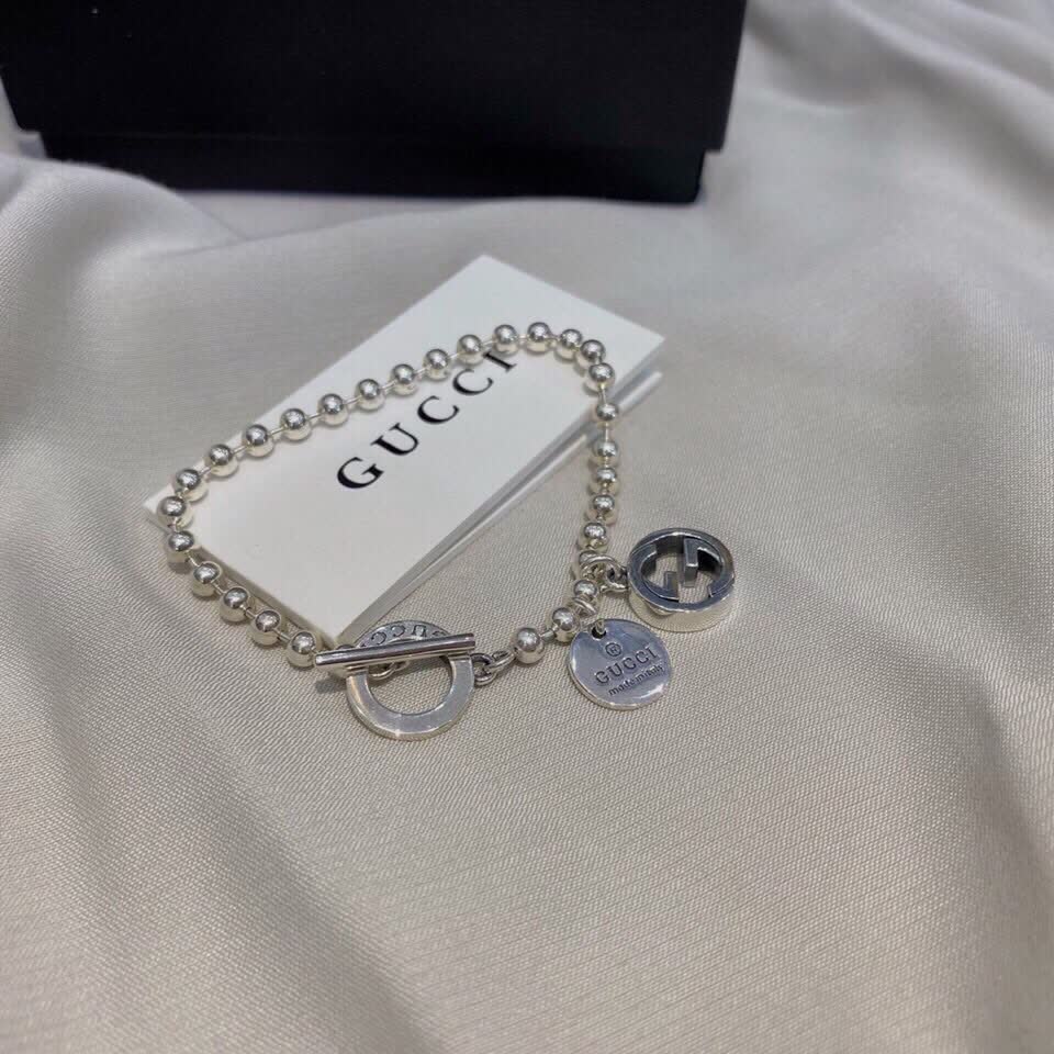 Gucci Silver Beaded Bracelet with Logo Charm