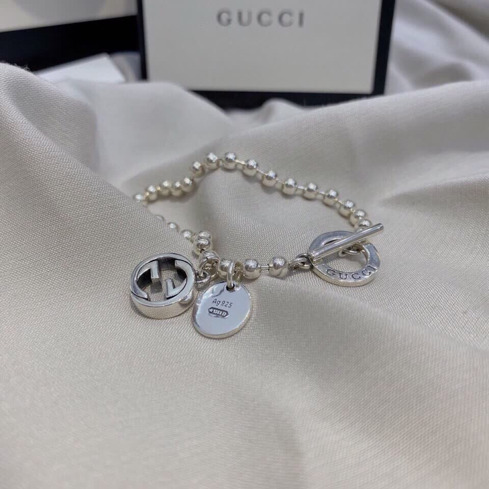 Gucci Silver Beaded Bracelet with Logo Charm