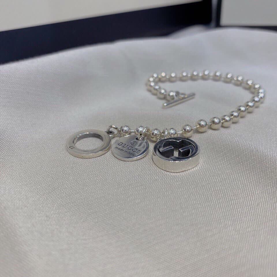 Gucci Silver Beaded Bracelet with Logo Charm
