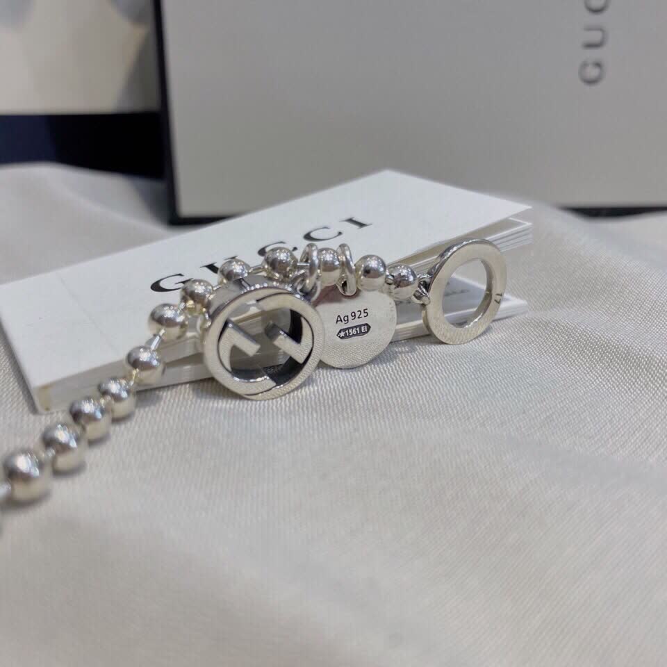 Gucci Silver Beaded Bracelet with Logo Charm