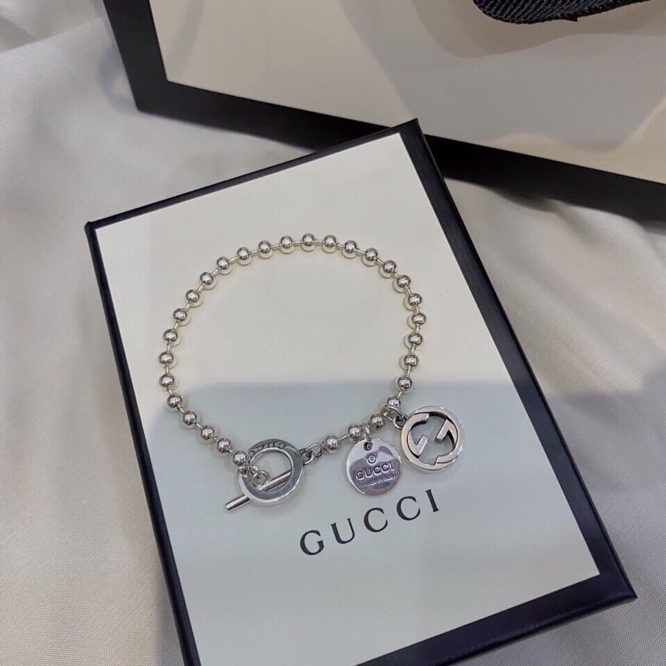 Gucci Silver Beaded Bracelet with Logo Charm