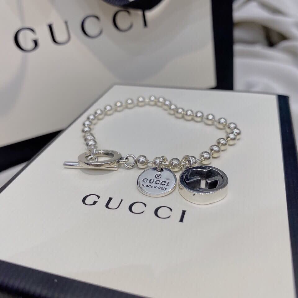 Gucci Silver Beaded Bracelet with Logo Charm