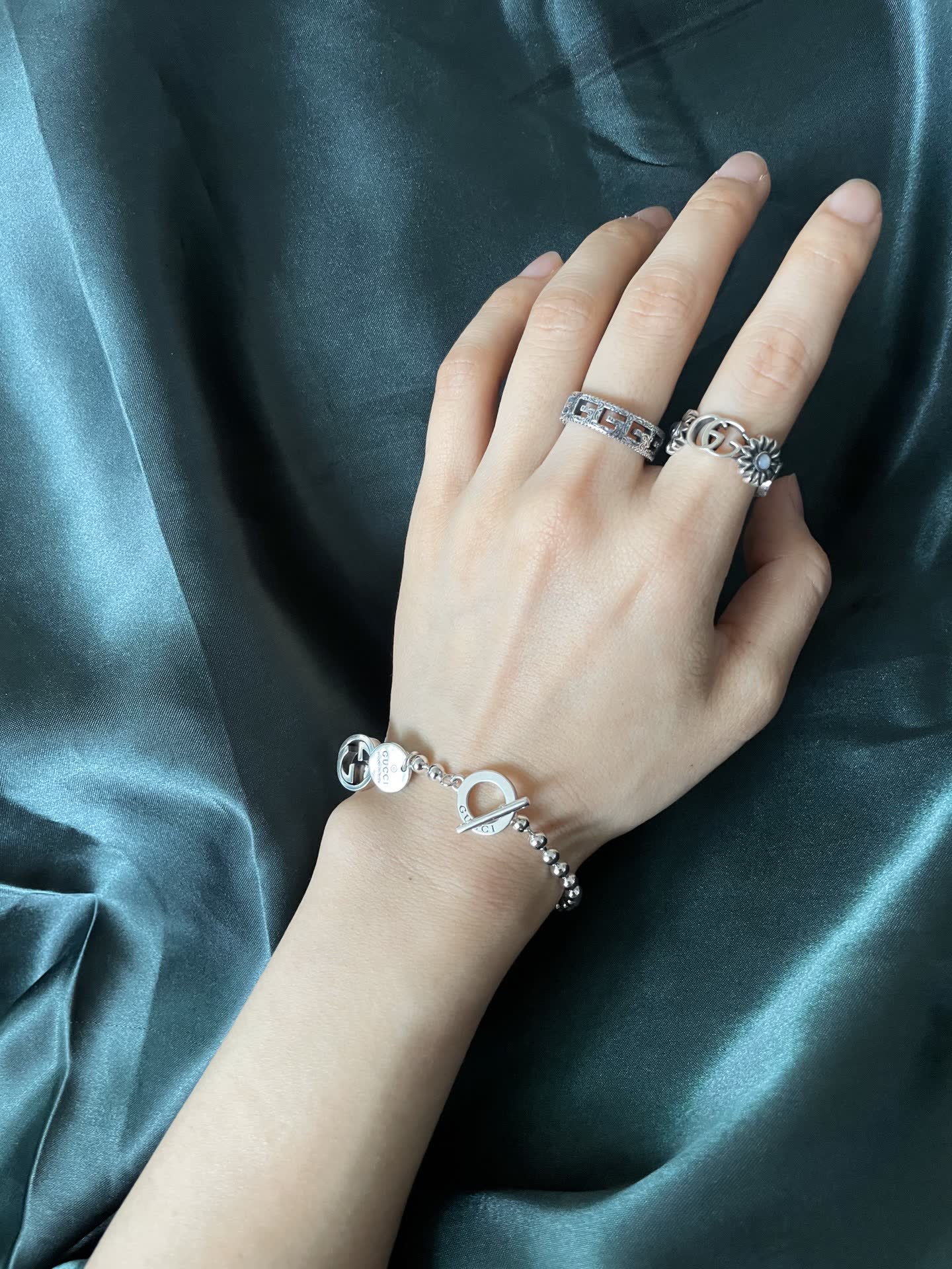 Gucci Silver Beaded Bracelet with Logo Charm