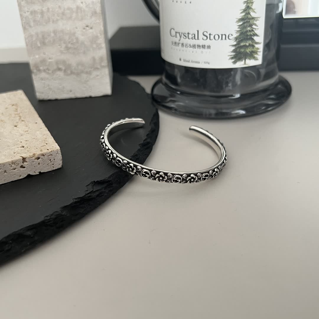 Gucci Sterling Silver Cuff Bracelet with Floral Design