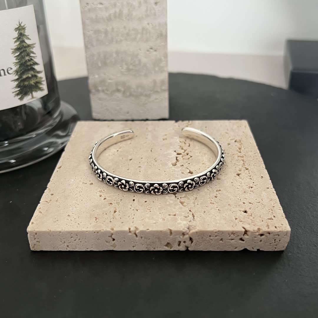 Gucci Sterling Silver Cuff Bracelet with Floral Design Gucci Sterling Silver Cuff Bracelet with Floral Design