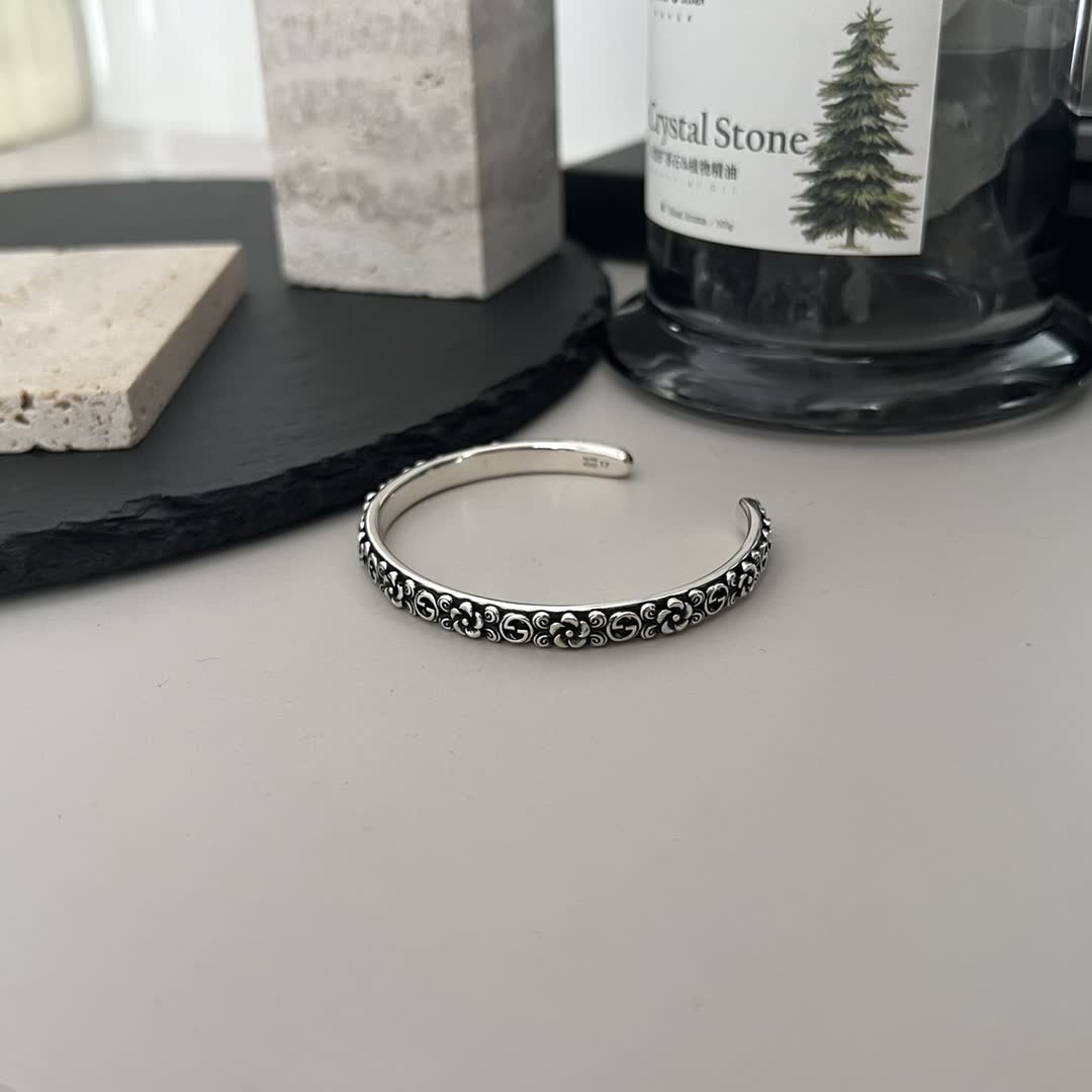 Gucci Sterling Silver Cuff Bracelet with Floral Design