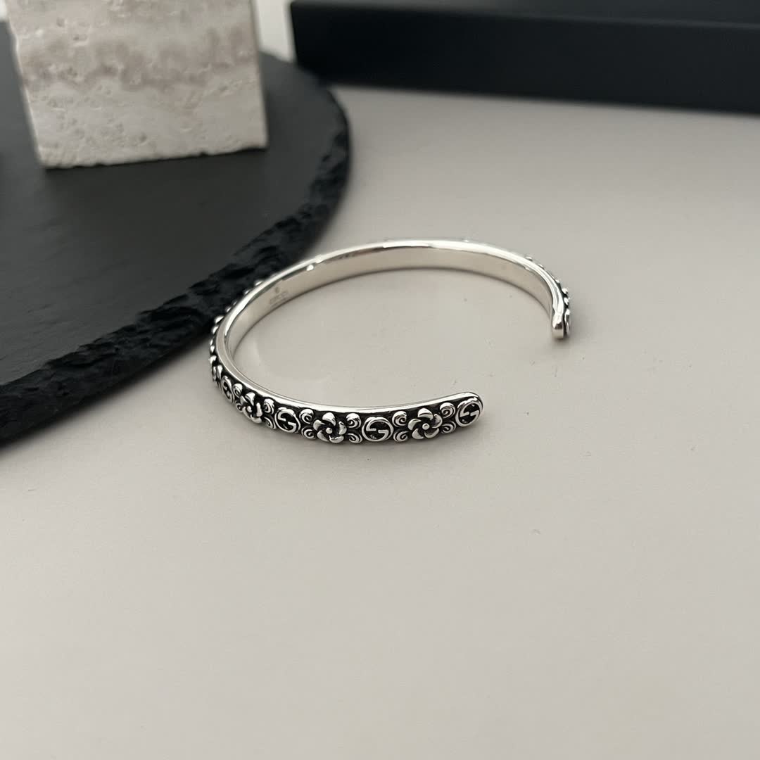 Gucci Sterling Silver Cuff Bracelet with Floral Design