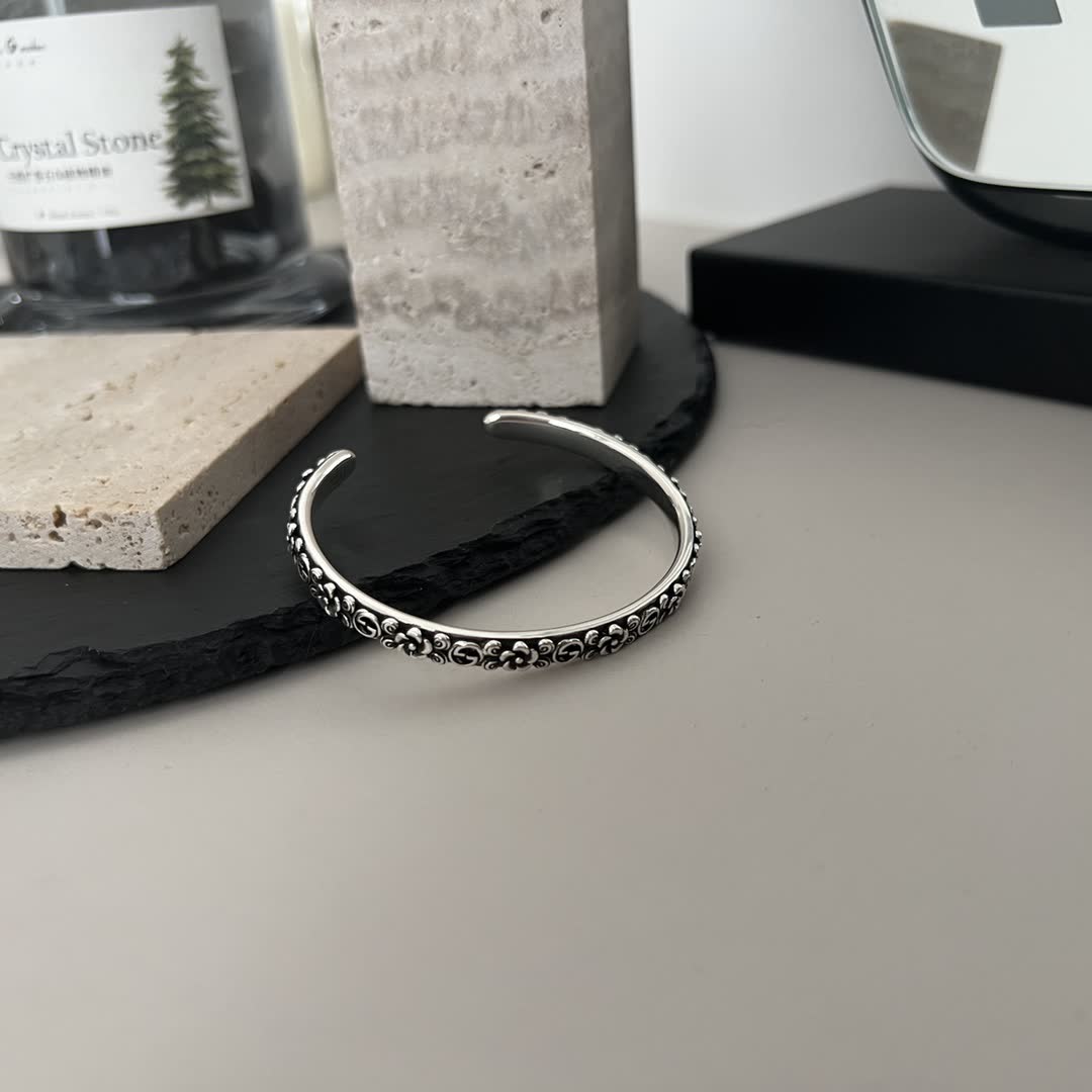 Gucci Sterling Silver Cuff Bracelet with Floral Design