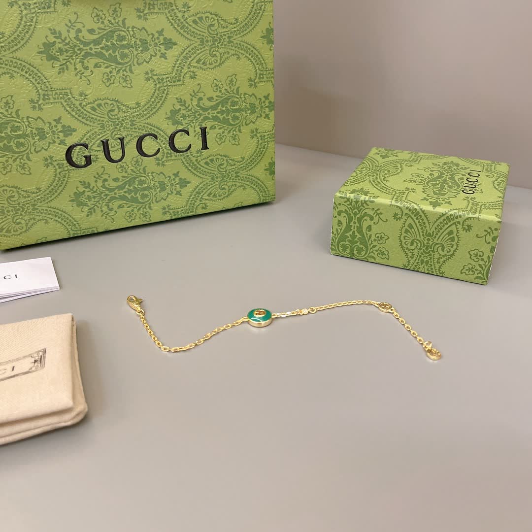 Gucci Gold-Plated Bracelet with Green Enamel