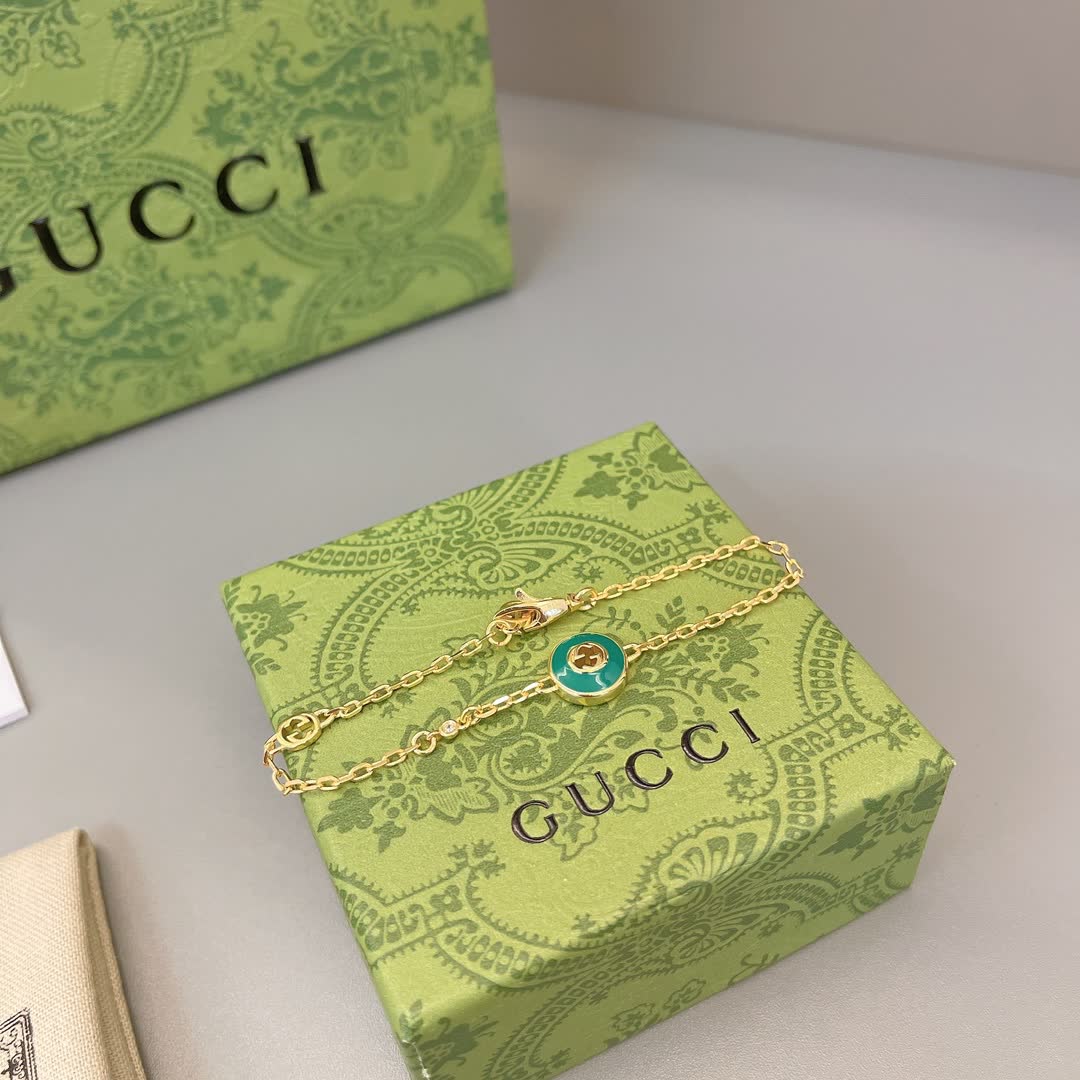 Gucci Gold-Plated Bracelet with Green Enamel