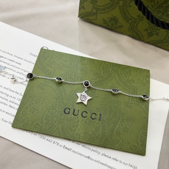 Gucci Silver Star and Black Stone Bracelet