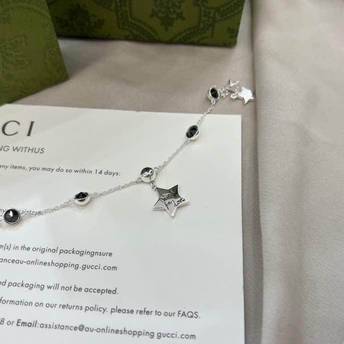 Gucci Silver Star and Black Stone Bracelet