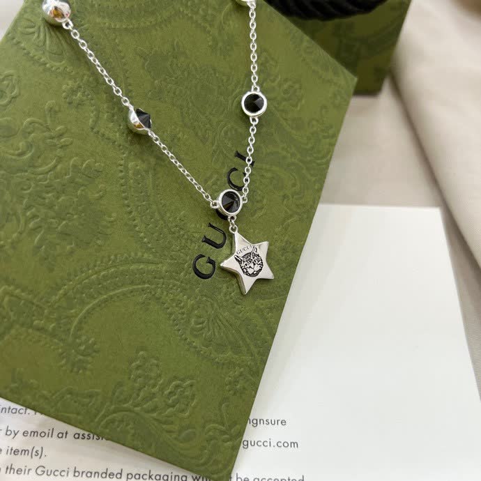 Gucci Silver Star and Black Stone Bracelet