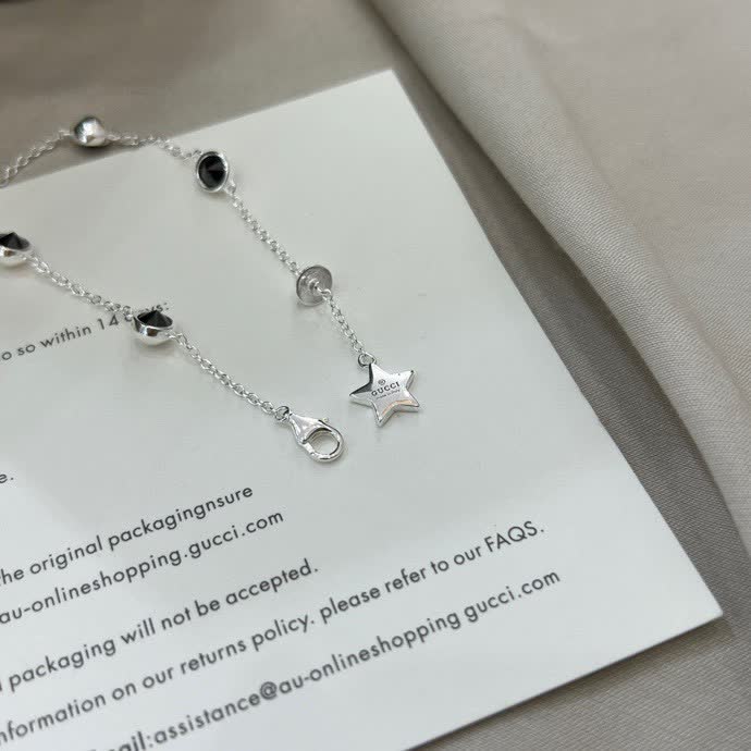 Gucci Silver Star and Black Stone Bracelet