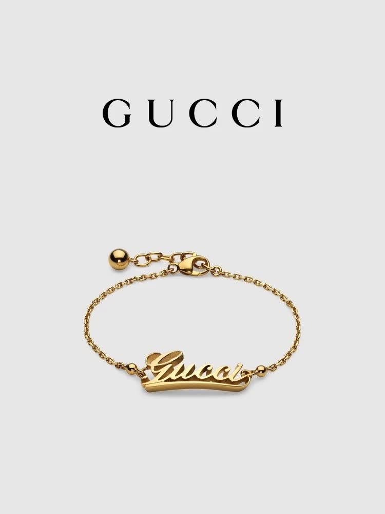 Gucci Gold Tone Logo Bracelet Gucci Gold Tone Logo Bracelet