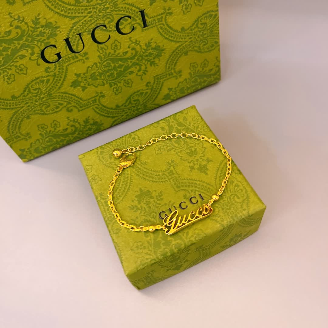 Gucci Gold Tone Logo Bracelet