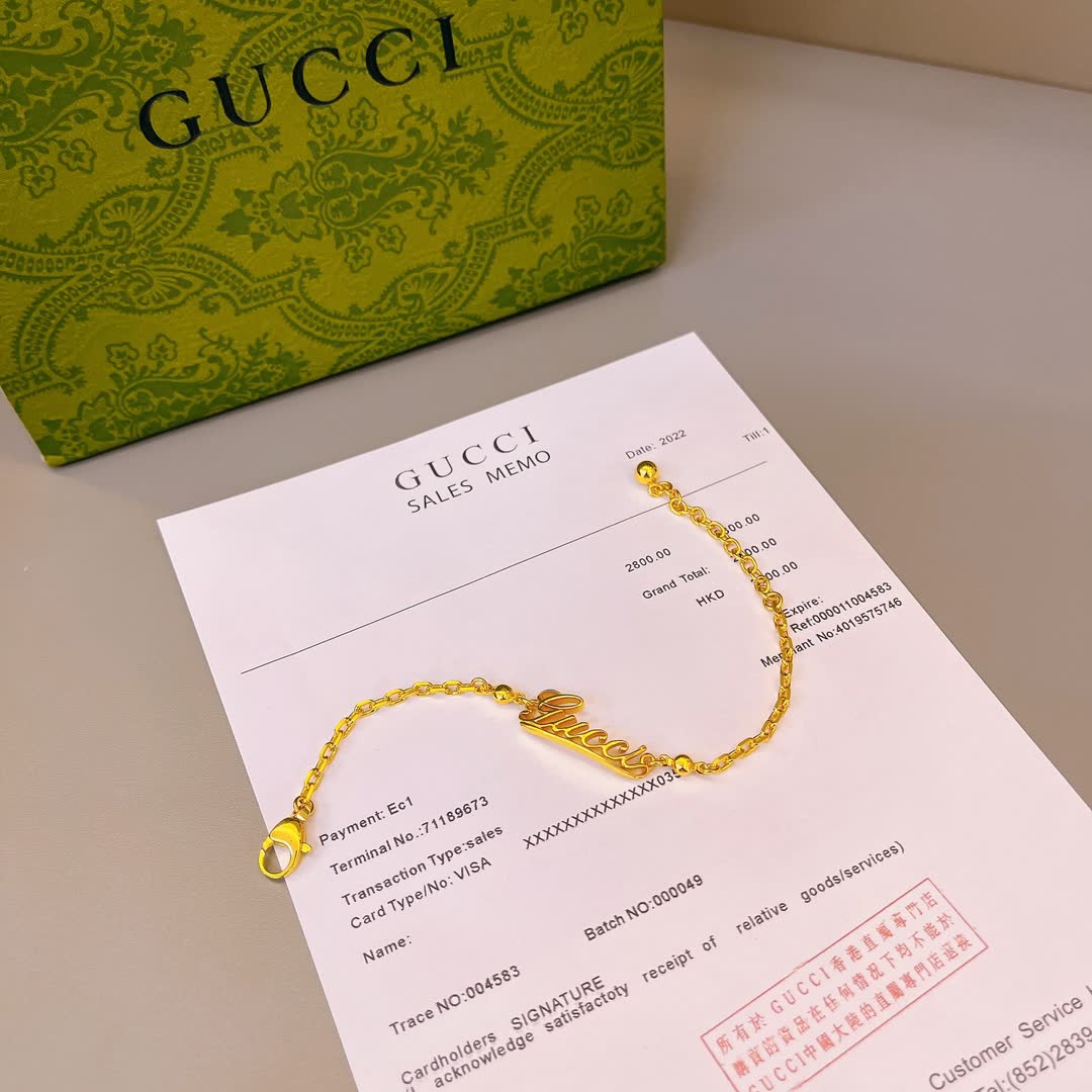 Gucci Gold Tone Logo Bracelet