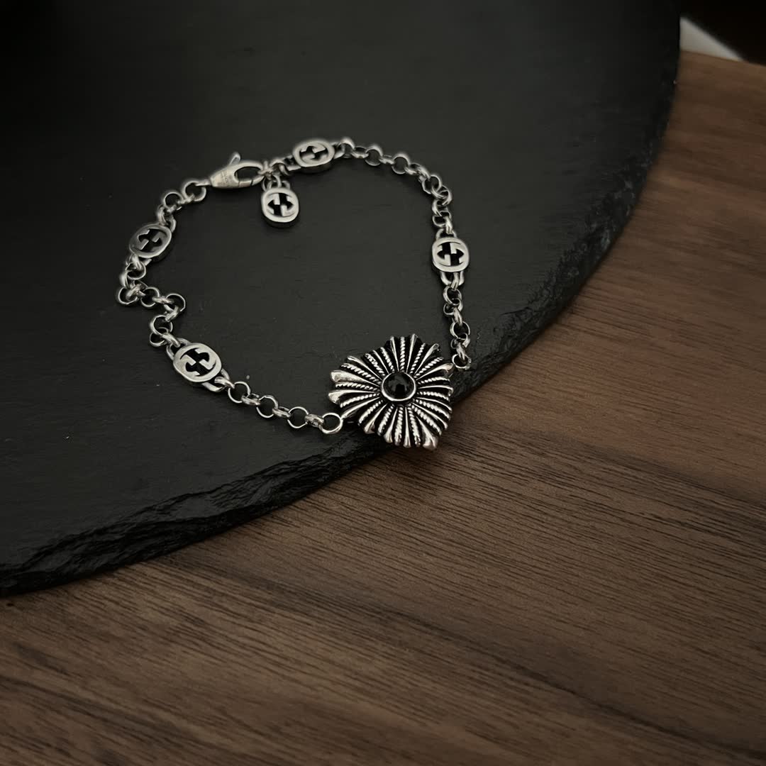 Gucci Silver Bracelet with Interlocking G Logo and Sunburst Design