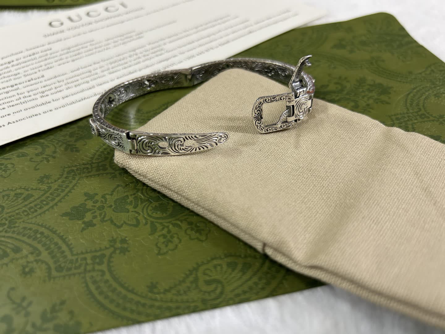 Gucci Silver Bracelet with Ornate Design