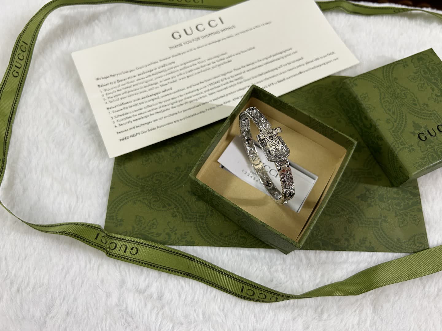 Gucci Silver Bracelet with Ornate Design