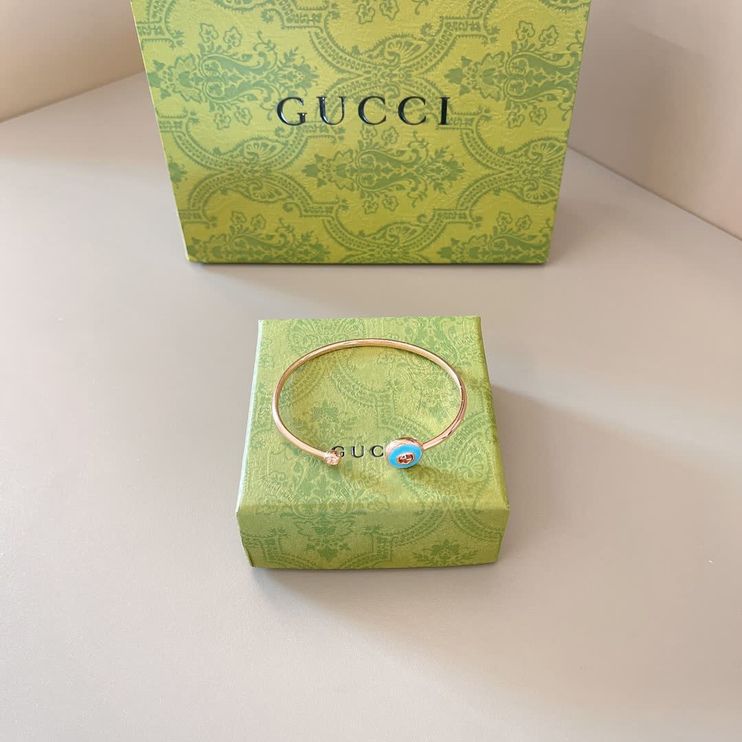 Gucci Gold Tone Blue Enamel Charm Bracelet Gucci Gold Tone Blue Enamel Charm Bracelet
