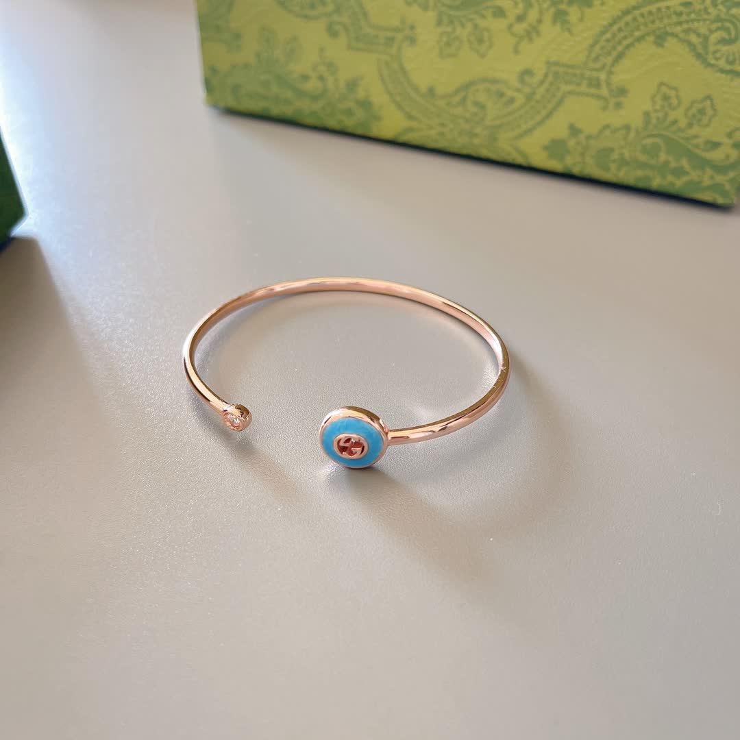 Gucci Gold Tone Blue Enamel Charm Bracelet