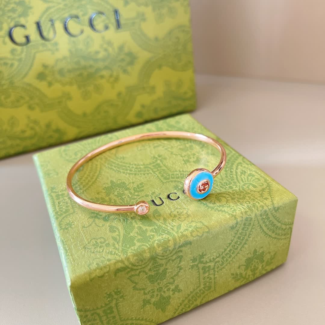 Gucci Gold Tone Blue Enamel Charm Bracelet