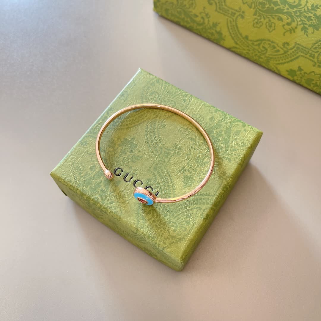 Gucci Gold Tone Blue Enamel Charm Bracelet