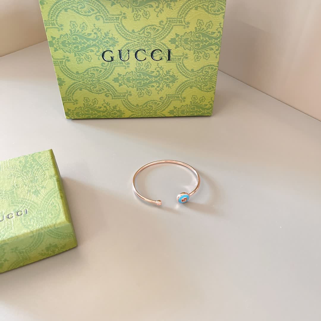 Gucci Gold Tone Blue Enamel Charm Bracelet