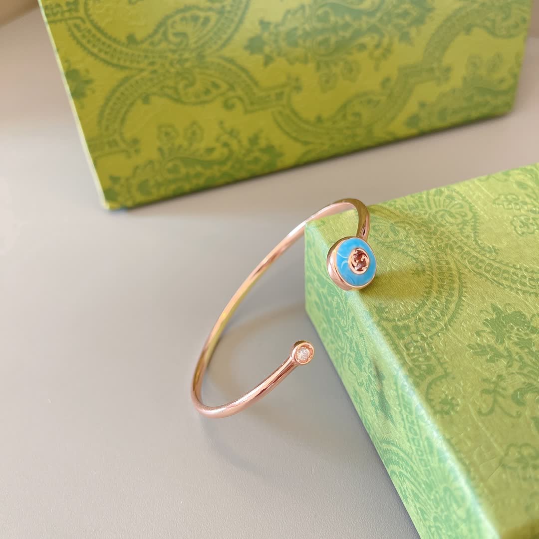 Gucci Gold Tone Blue Enamel Charm Bracelet