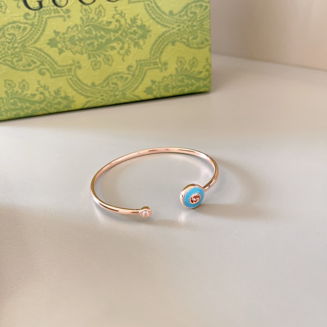 Gucci Gold Tone Blue Enamel Charm Bracelet