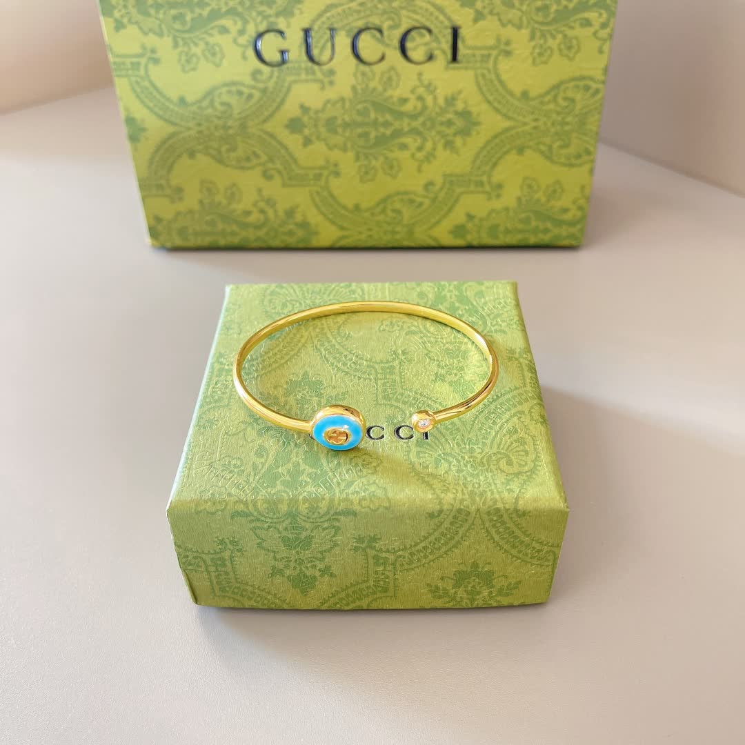 Gucci Gold Tone Blue Enamel Evil Eye Bracelet Gucci Gold Tone Blue Enamel Evil Eye Bracelet